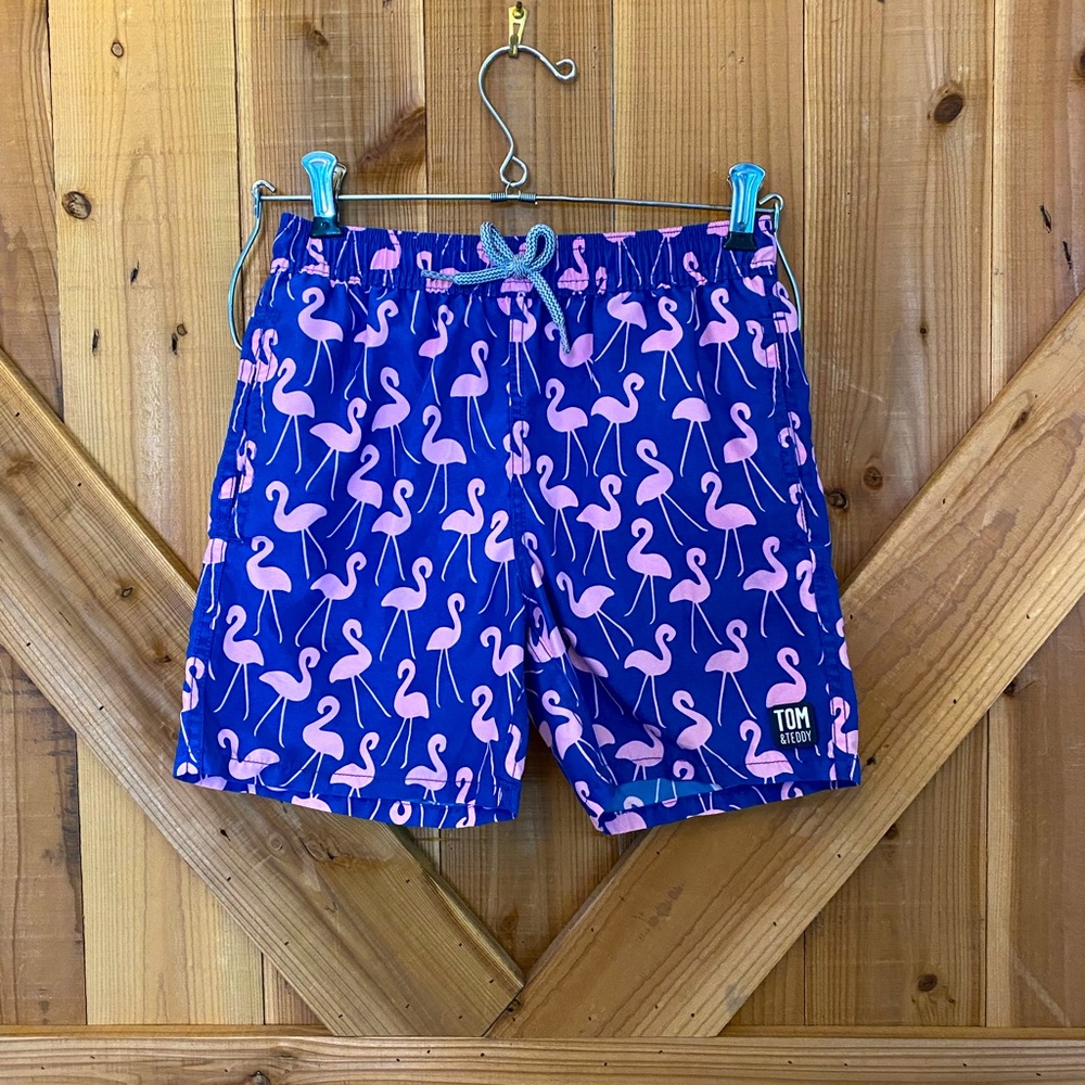 Tom & Teddy Boys’ swim trunks size 7/8. Blue with pink flamingos